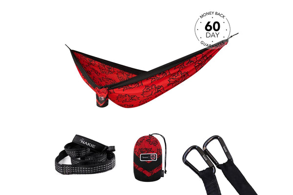 Red and black Dragons NRL recycled hammock with black straps and carabiners, displayed with storage bag