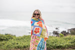 Retro Shores sustainable down puffy blanket with colorful geometric patchwork pattern in orange, blue preview #2