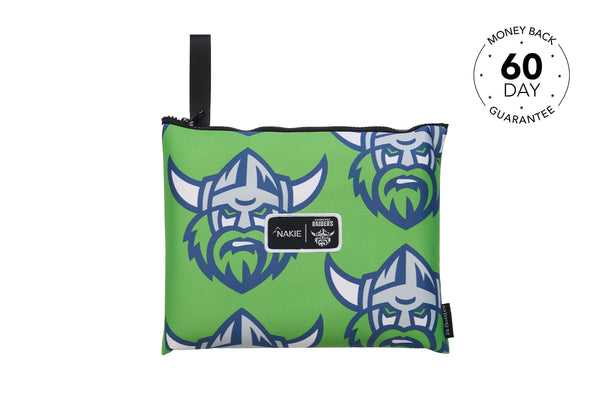 Green beach towel with blue and white viking head pattern, black handles, Nakie Raiders logo label