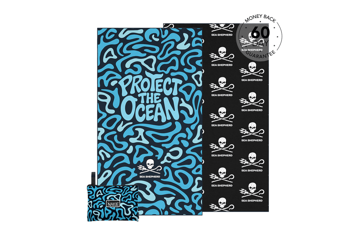Recycled beach towel with turquoise abstract wave pattern, "Protect the Ocean" text, and Sea Shepherd skull logo, shown flat 